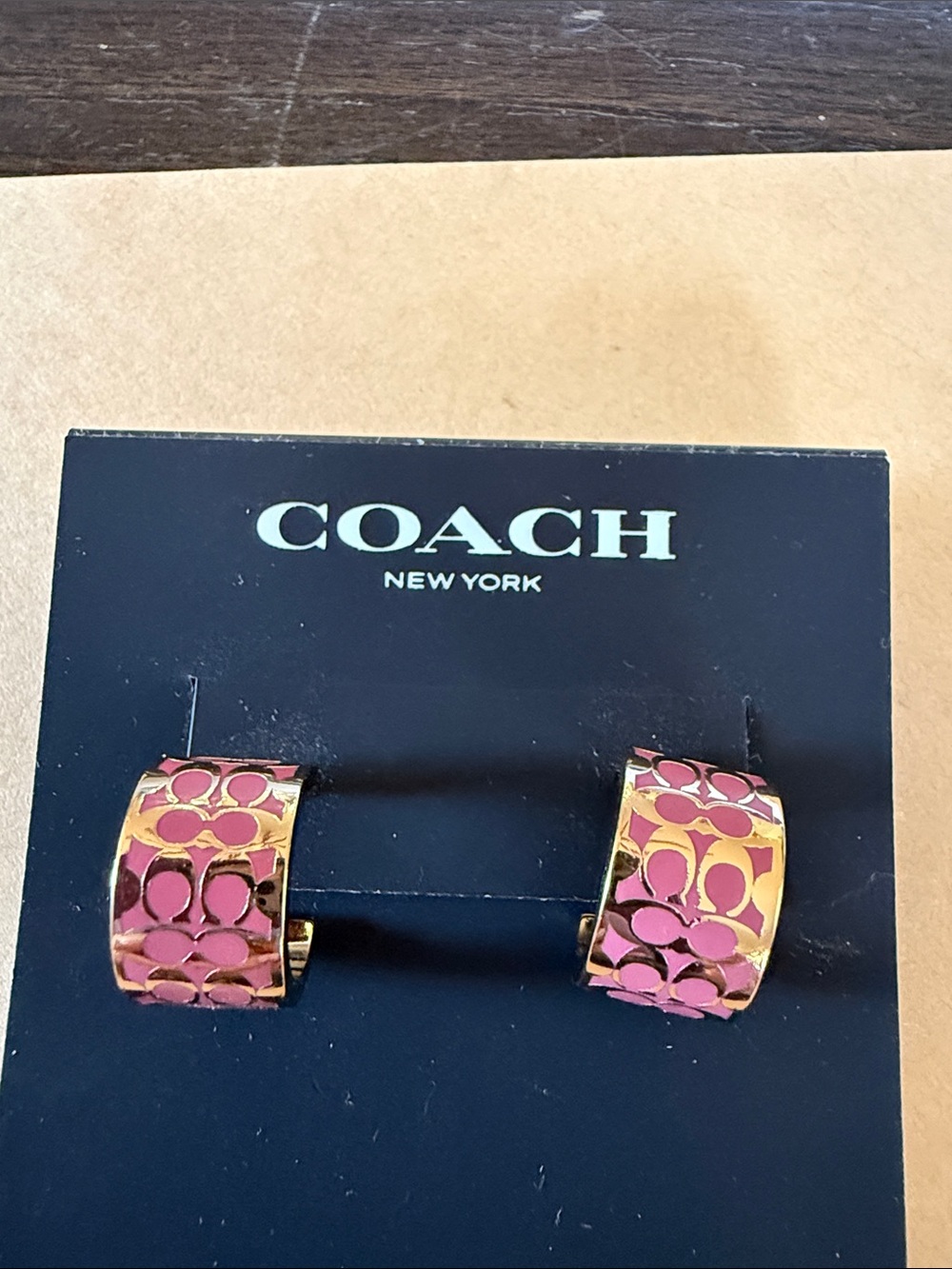 Coach Gold-Tone Hoop Earrings with Pink Enamel Signature Pattern